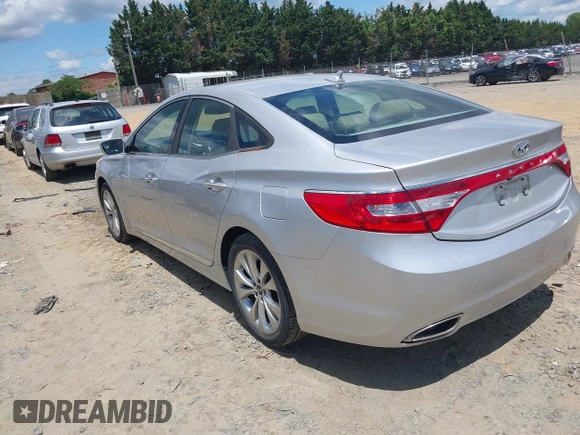 2014 Hyundai Azera Limited z VIN KMHFH4JG9EA397338, wystawiony jako IAAI lot #42352208 z przebiegiem 90 253 mil mil oraz . Historia ofert i sprzedaży dostępna na DreamBid. Obrazek 3.