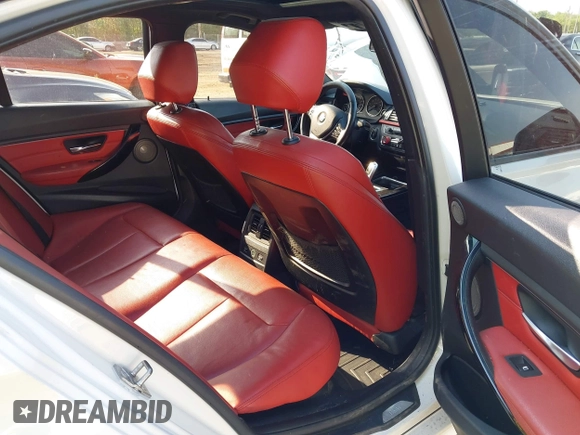 2013 BMW 3 Series 335i xDrive with VIN WBA3B9C54DF587421, listed as a IAAI auction lot 42165857 with 142,331 mi miles. Bid and sale history available at carsss.com. Image 8.
