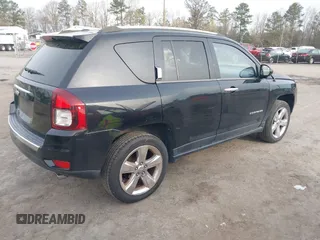 2014 Jeep Compass Limited with VIN 1C4NJDCB9ED549543, listed as a IAAI auction lot 41938699 with 195,973 mi miles. Bid and sale history available at carsss.com. Image 4.