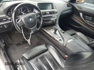 2012 BMW 6 Series 650i z VIN WBALZ3C52CC397545, wystawiony jako Copart lot #55976625 z przebiegiem 147 352 mil mil oraz Tytuł czysty. Historia ofert i sprzedaży dostępna na DreamBid. Obrazek 8.