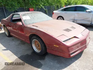 1989 Pontiac Firebird z VIN 1G2FW2185KL214528, wystawiony jako IAAI lot #42253302 z przebiegiem 148 238 mil mil oraz . Historia ofert i sprzedaży dostępna na DreamBid. Obrazek 1.