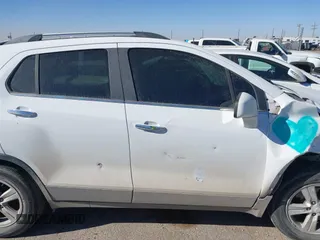 2019 Chevrolet Trax LT with VIN 3GNCJLSB0KL150987, listed as a IAAI auction lot 41408466 with 113,451 mi miles and . Bid and sale history available at carsss.com. Image 13.
