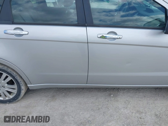 2010 Ford Focus SEL with VIN 1FAHP3HN3AW131735, listed as a IAAI auction lot 41887471 with 114,320 mi miles. Bid and sale history available at carsss.com. Image 13.