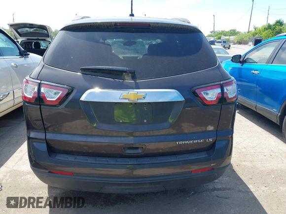 2015 Chevrolet Traverse LS z VIN 1GNKRFED1FJ152781, wystawiony jako IAAI lot #42279336 z przebiegiem 131 491 mil mil oraz . Historia ofert i sprzedaży dostępna na DreamBid. Obrazek 16.