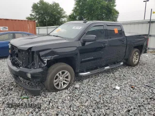 2016 Chevrolet Silverado 1500 LT with VIN 3GCUKREC1GG388719, listed as a Copart auction lot 49661455 with 138,886 mi miles and Salvage Title. Bid and sale history available at DreamBid. Image 1.