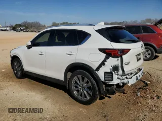2021 Mazda CX-5 Signature with VIN JM3KFBEY5M0352778, listed as a Copart auction lot 47016035 with 37,961 mi miles and Salvage Title. Bid and sale history available at carsss.com. Image 2.