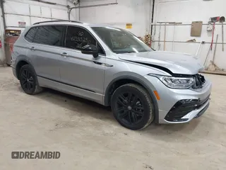 2022 Volkswagen Tiguan SE R-Line Black with VIN 3VV8B7AX8NM044884, listed as a IAAI auction lot 42331323 with 45,945 mi miles and . Bid and sale history available at DreamBid. Image 1.