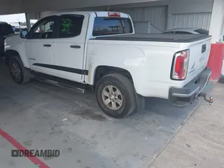 2015 GMC Canyon 2WD z VIN 1GTG5AEA8F1256722, wystawiony jako IAAI lot #42159367 z przebiegiem 140 963 mil mil oraz . Historia ofert i sprzedaży dostępna na DreamBid. Obrazek 3.