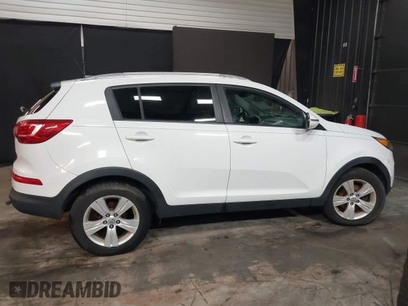 2012 Kia Sportage LX with VIN KNDPB3A26C7269092, listed as a IAAI auction lot 41892059 with 149,000 mi miles. Bid and sale history available at carsss.com. Image 13.