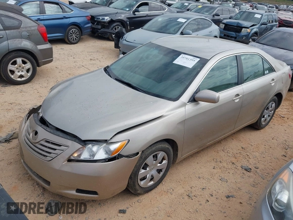 2007 Toyota Camry CE with VIN 4T1BE46K97U569695, listed as a IAAI auction lot 39701395 with 282,284 mi miles and . Bid and sale history available at DreamBid. Image 2.