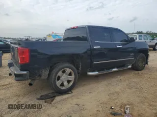 2017 Chevrolet Silverado 1500 LTZ with VIN 3GCPCSECXHG315030, listed as a Copart auction lot 50766385 with 127,349 mi miles and Salvage Title. Bid and sale history available at DreamBid. Image 3.
