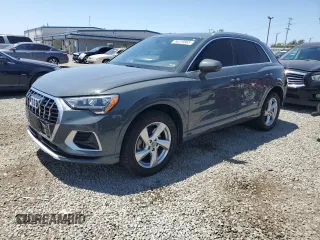 2020 Audi Q3 Premium z VIN WA1AECF38L1009322, wystawiony jako Copart lot #56229865 z przebiegiem 66 387 mil mil oraz Szkoda całkowita • Salvage title. Historia ofert i sprzedaży dostępna na DreamBid. Obrazek 1.