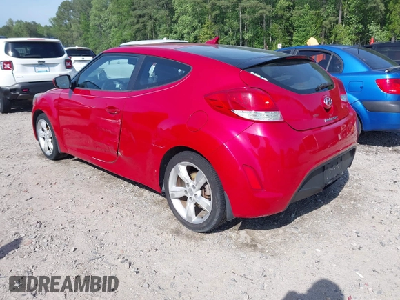 2013 Hyundai Veloster w/Gray Int with VIN KMHTC6AD8DU112810, listed as a IAAI auction lot 42144625 with 142,524 mi miles and . Bid and sale history available at DreamBid. Image 3.