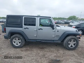 2013 Jeep Wrangler Unlimited Sport z VIN 1C4BJWDG3DL669593, wystawiony jako IAAI lot #42161265 z przebiegiem 89 747 mil mil oraz . Historia ofert i sprzedaży dostępna na DreamBid. Obrazek 14.