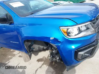 2021 Chevrolet Colorado 4WD Z71 z VIN 1GCGTDEN4M1212479, wystawiony jako IAAI lot #41937713 z przebiegiem 56 164 mil mil oraz . Historia ofert i sprzedaży dostępna na DreamBid. Obrazek 6.