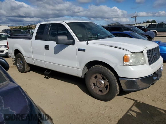 2005 Ford F-150 XLT with VIN 1FTPX12595NA67280, listed as a Copart auction lot 56922545 with 237,318 mi miles and Salvage title. Bid and sale history available at DreamBid. Image 4.