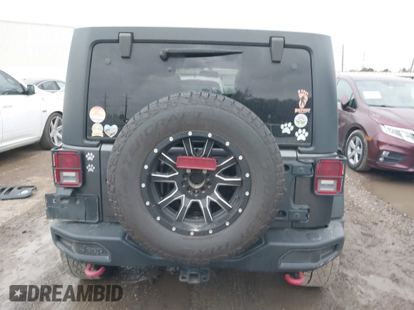 2018 Jeep Wrangler Unlimited Rubicon Recon with VIN 1C4BJWFG4JL827920, listed as a IAAI auction lot 41368319 with 110,835 mi miles and . Bid and sale history available at DreamBid. Image 17.