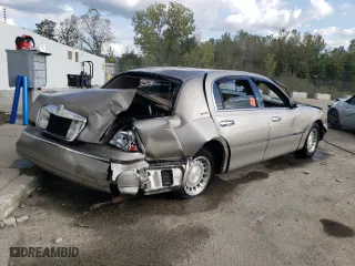 2002 Lincoln Town Car Executive with VIN 1LNHM81W32Y663460, listed as a Copart auction lot 72064874 with 153,251 mi miles and Salvage Title. Bid and sale history available at carsss.com. Image 3.