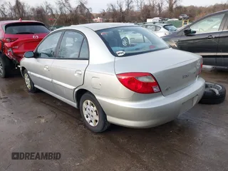 2001 Kia Rio with VIN KNADC123716042067, listed as a IAAI auction lot 41449479 with 113,108 mi miles. Bid and sale history available at carsss.com. Image 3.
