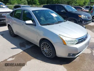 2009 Ford Focus SES with VIN 1FAHP36N69W102910, listed as a IAAI auction lot 42098402 with 149,957 mi miles. Bid and sale history available at carsss.com. Image 1.