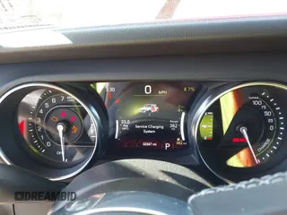 2023 Jeep Wrangler Sahara z VIN 1C4JJXP63PW568190, wystawiony jako IAAI lot #42133650 z przebiegiem 32 347 mil mil oraz . Historia ofert i sprzedaży dostępna na DreamBid. Obrazek 7.