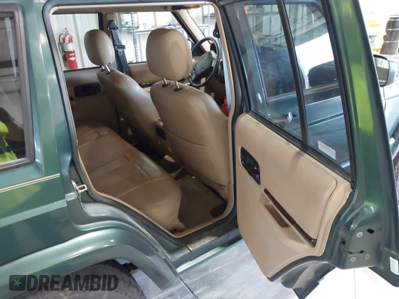 2001 Jeep Cherokee Sport with VIN 1J4FF58S51L579766, listed as a IAAI auction lot 42623211 with 257,681 mi miles and . Bid and sale history available at DreamBid. Image 8.