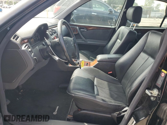 2002 Mercedes-Benz E-Class with VIN WDBJF82JX2X064384, listed as a Copart auction lot 53058325 with 188,440 mi miles and Salvage Title. Bid and sale history available at carsss.com. Image 7.