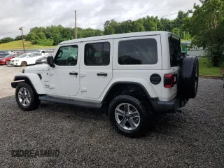 2020 Jeep Wrangler Unlimited Sahara with VIN 1C4HJXEG4LW272051, listed as a Copart auction lot 61090665 with 100,148 mi miles and Clean title. Bid and sale history available at DreamBid. Image 2.