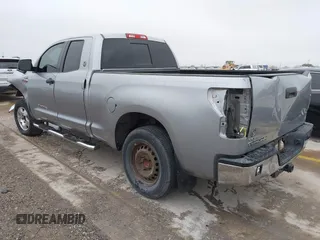 2012 Toyota Tundra z VIN 5TFRY5F18CX121917, wystawiony jako IAAI lot #41475681 z przebiegiem 166 507 mil mil oraz . Historia ofert i sprzedaży dostępna na DreamBid. Obrazek 3.