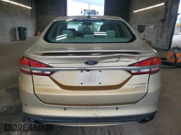 2017 Ford Fusion Titanium z VIN 3FA6P0K96HR132389, wystawiony jako Copart lot #57312665 z przebiegiem Nie podano mil oraz Szkoda całkowita • Salvage title. Historia ofert i sprzedaży dostępna na DreamBid. Obrazek 6.