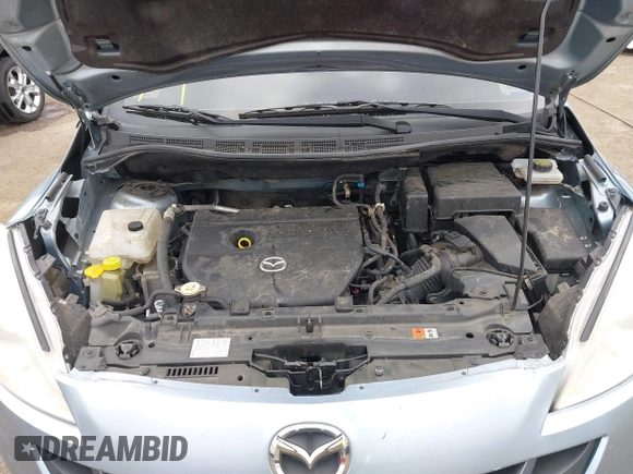 2012 Mazda 5 Grand Touring with VIN JM1CW2DL4C0141511, listed as a IAAI auction lot 42001392 with 99,097 mi miles and . Bid and sale history available at carsss.com. Image 10.