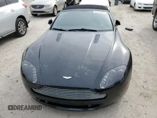 2009 Aston Martin Vantage z VIN SCFBF04CX9GD11942, wystawiony jako Copart lot #43771214 z przebiegiem 52 730 mil mil oraz . Historia ofert i sprzedaży dostępna na DreamBid. Obrazek 5.