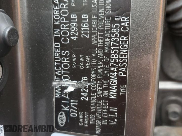 2011 Kia Optima LX z VIN KNAGM4A75B5173585, wystawiony jako Copart lot #51895325 z przebiegiem 137 318 mil mil oraz Szkoda całkowita • Salvage title. Historia ofert i sprzedaży dostępna na DreamBid. Obrazek 12.