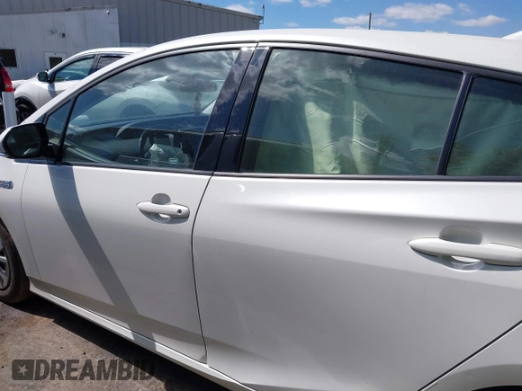2018 Toyota Prius Plus with VIN JTDKARFP8J3101754, listed as a IAAI auction lot 42045438 with 72,317 mi miles and . Bid and sale history available at DreamBid. Image 14.