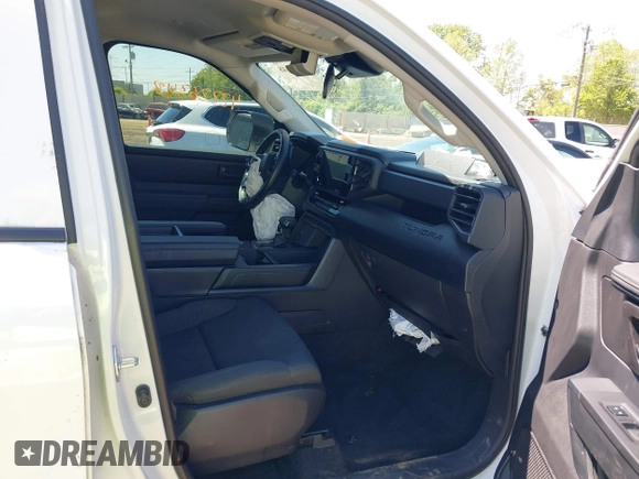 2023 Toyota Tundra SR with VIN 5TFKB5DB0PX065072, listed as a IAAI auction lot 42226348 with 53,539 mi miles and . Bid and sale history available at DreamBid. Image 5.
