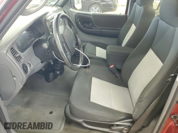 2009 Ford Ranger XL with VIN 1FTYR10D39PA15761, listed as a Copart auction lot 61823265 with 148,225 mi miles and Salvage title. Bid and sale history available at DreamBid. Image 7.