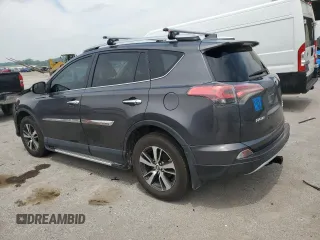 2016 Toyota RAV4 XLE with VIN 2T3RFREV0GW412875, listed as a Copart auction lot 59497545 with 226,604 mi miles and Salvage title. Bid and sale history available at DreamBid. Image 2.