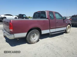 1999 Ford F-150 XL with VIN 1FTRX17L2XKB78998, listed as a Copart auction lot 65004535 with 155,271 mi miles and Salvage title. Bid and sale history available at DreamBid. Image 3.