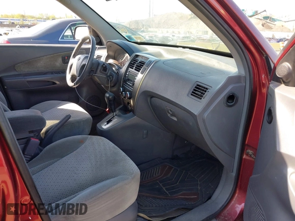 2005 Hyundai Tucson GLS with VIN KM8JN12D35U180615, listed as a IAAI auction lot 42104729 with 128,123 mi miles. Bid and sale history available at carsss.com. Image 5.