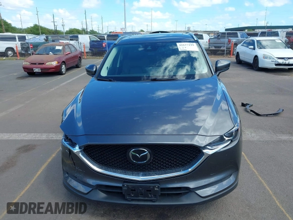 2021 Mazda CX-5 Touring with VIN JM3KFACM2M1348305, listed as a IAAI auction lot 41627199 with 30,044 mi miles. Bid and sale history available at carsss.com. Image 13.