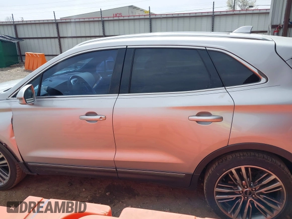2015 Lincoln MKC with VIN 5LMTJ2AH8FUJ23341, listed as a IAAI auction lot 41828159 with 103,562 mi miles. Bid and sale history available at carsss.com. Image 15.