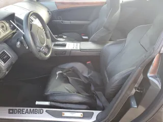 2005 Aston Martin DB9 z VIN SCFAD01A75GA02198, wystawiony jako Copart lot #75564554 z przebiegiem Nie podano mil oraz Nie do naprawy • Non repairable. Historia ofert i sprzedaży dostępna na DreamBid. Obrazek 7.