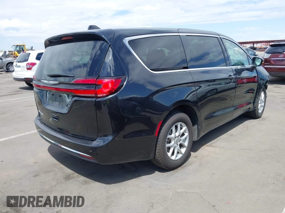 2023 Chrysler Pacifica Touring L with VIN 2C4RC1BG7PR510912, listed as a IAAI auction lot 41967473 with 67,907 mi miles and . Bid and sale history available at DreamBid. Image 4.