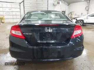 2013 Honda Civic Cpe EX with VIN 2HGFG3B82DH525350, listed as a IAAI auction lot 42129940 with 217,611 mi miles. Bid and sale history available at carsss.com. Image 16.