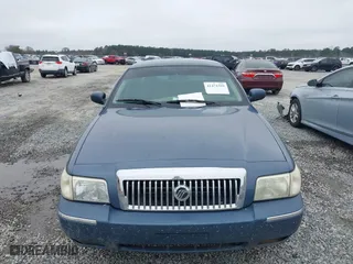 2007 Mercury Grand Marquis GS with VIN 2MEFM74V27X609128, listed as a IAAI auction lot 41474359 with 99,050 mi miles. Bid and sale history available at carsss.com. Image 12.