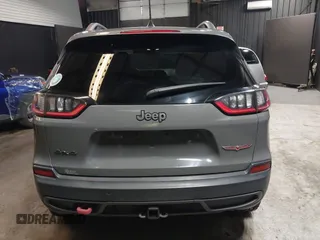 2019 Jeep Cherokee Trailhawk Elite with VIN 1C4PJMBX8KD458989, listed as a IAAI auction lot 41881517 with 89,045 mi miles. Bid and sale history available at carsss.com. Image 16.