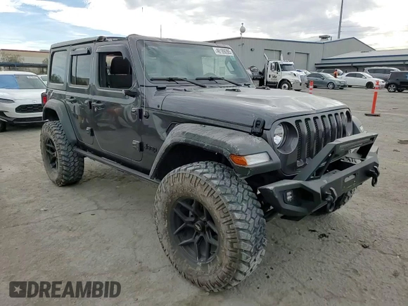 2022 Jeep Wrangler Unlimited Sport with VIN 1C4HJXDG6NW133687, listed as a Copart auction lot 46189285 with 15,083 mi miles and Salvage Title. Bid and sale history available at DreamBid. Image 12.