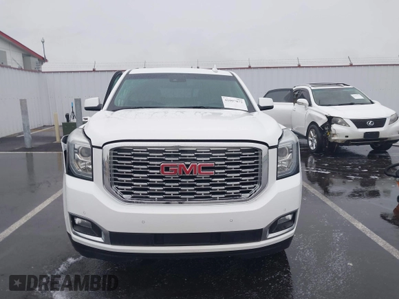 2018 GMC Yukon Denali with VIN 1GKS2CKJ8JR274087, listed as a IAAI auction lot 41097872 with 76,828 mi miles. Bid and sale history available at carsss.com. Image 13.