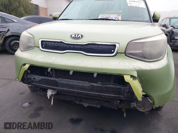 2014 Kia Soul with VIN KNDJN2A23E7736561, listed as a IAAI auction lot 42084212 with 114,555 mi miles and . Bid and sale history available at DreamBid. Image 6.