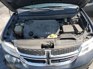 2015 Dodge Journey SXT with VIN 3C4PDCBG6FT718131, listed as a Copart auction lot 62214265 with 108,986 mi miles and Salvage title. Bid and sale history available at DreamBid. Image 12.